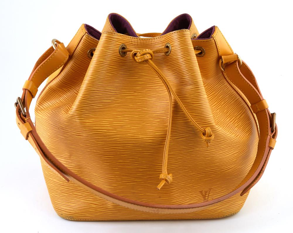 Louis Vuitton Yellow Noe PM Epi Leather Shoulder Bag,: Louis Vuitton Yellow Noe PM Epi Leather Shoulder Bag, with yellow stitching and brass hardware, opening to a purple suede interior with key ring, the strap with adjustable brass belt buckles, H.- 10 i