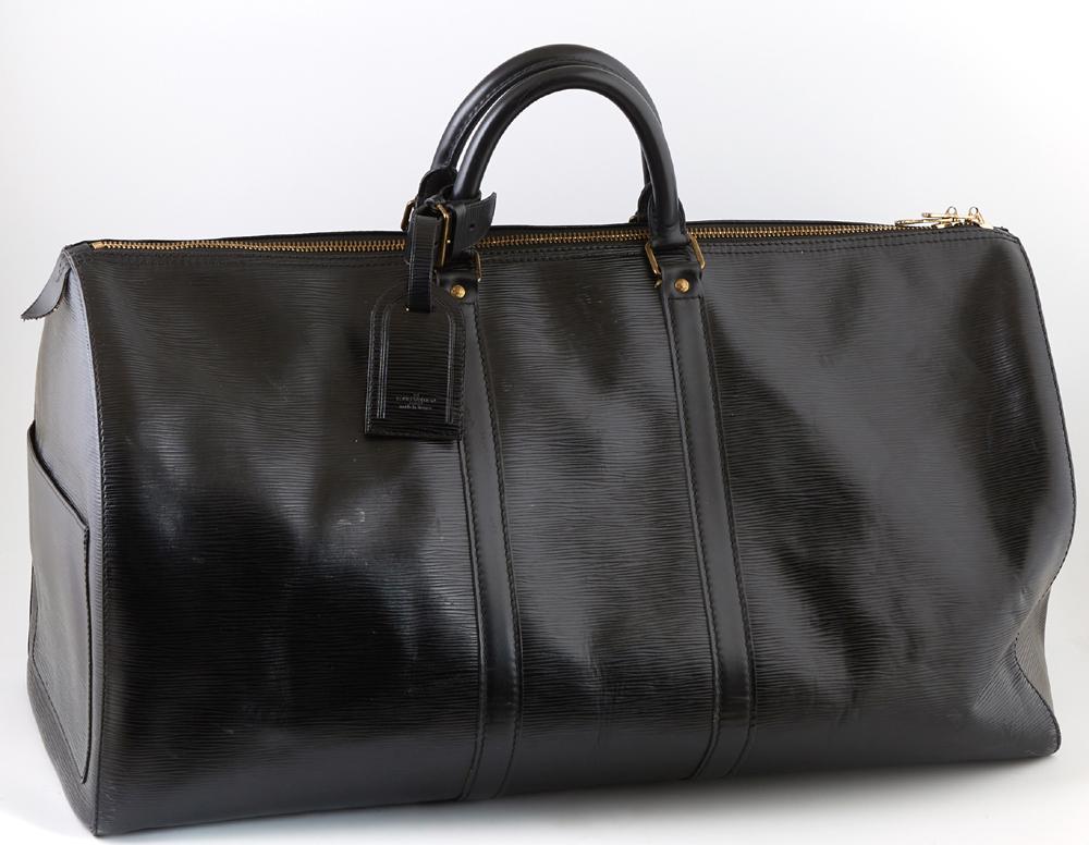 Louis Vuitton Keepall Black Epi Calf Leather 55 Travel: Louis Vuitton Keepall Black Epi Calf Leather 55 Travel Bag, with golden brass hardware, opening to a black suede interior, the exterior with an open side pouch and luggage tag, H.- 13 in., W.- 22 1/2 