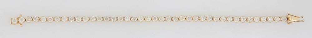 14K Yellow Gold Tennis Bracelet, each of the forty: 14K Yellow Gold Tennis Bracelet, each of the forty links mounted with a round diamond, total diamond wt.- 8.52 cts., L.- 7 1/2 in., with appraisal.