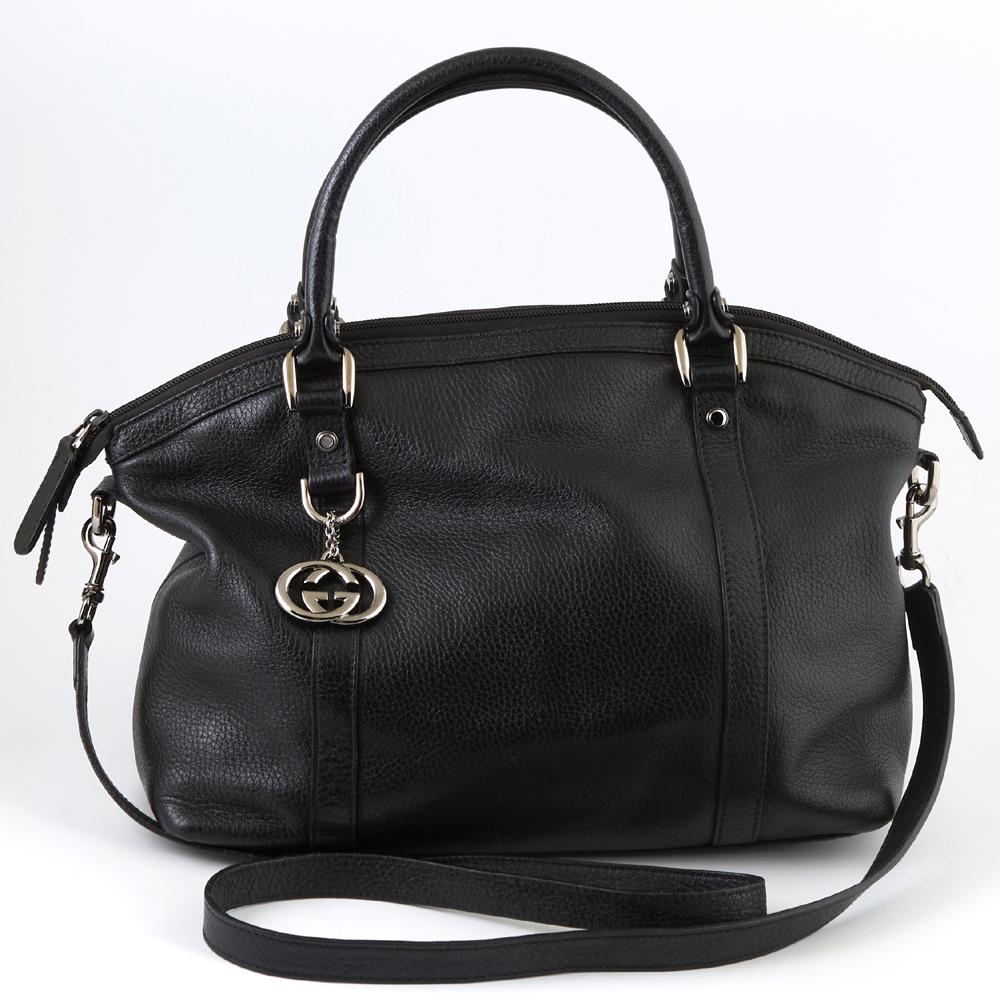Gucci Black Grained Leather Interlocking Charm: Gucci Black Grained Leather Interlocking Charm Convertible Tote, the exterior with gun metal hardware and charm, two leather handles and an adjustable leather strap, the top opening to a black canvas 