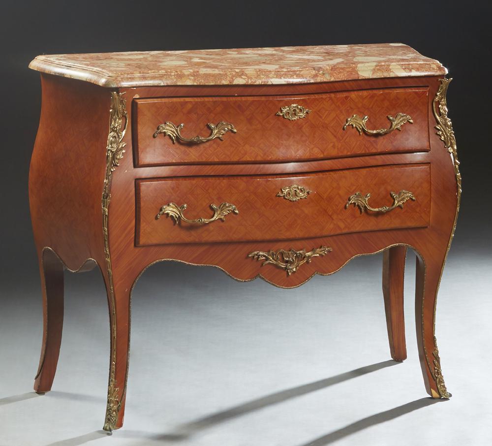 Louis XV Style Carved Mahogany Marble Top Bombe: Louis XV Style Carved Mahogany Marble Top Bombe Commode, 20th c, the stepped rounded edge highly figured pink marble over two bowfront drawers, flanked by bombe sides, on cabriole legs, H.- 31 in., W.