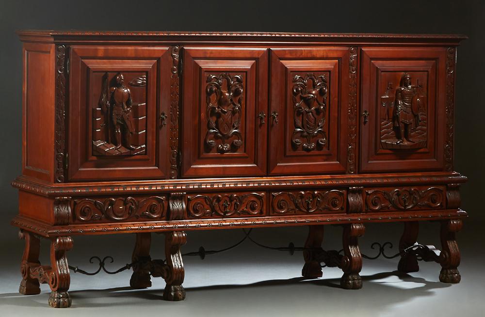 French Renaissance Style Carved Cherry Sideboard, 20th: French Renaissance Style Carved Cherry Sideboard, 20th c., the stepped rounded edge crown over four figural carved cupboard doors, flanked by scroll carved pilasters, on a base with four frieze drawer