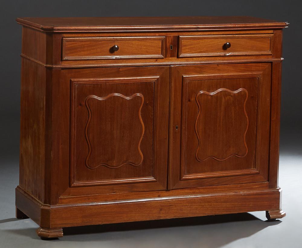 French Provincial Louis Philippe Carved Walnut: French Provincial Louis Philippe Carved Walnut Sideboard, 19th c., the rounded edge canted corner top over two frieze drawers, and double fielded panel cupboard doors, on a stepped plinth base on step