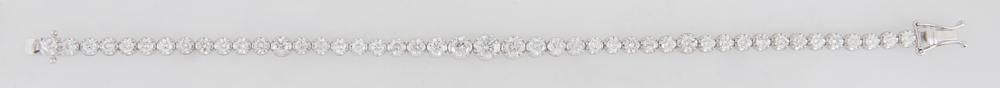 18K White Gold Diamond Link Bracelet, each of the: 18K White Gold Diamond Link Bracelet, each of the forty-five links with a graduated round diamond, total diamond wt.- 4.39 cts., L.- 7 in., with appraisal.