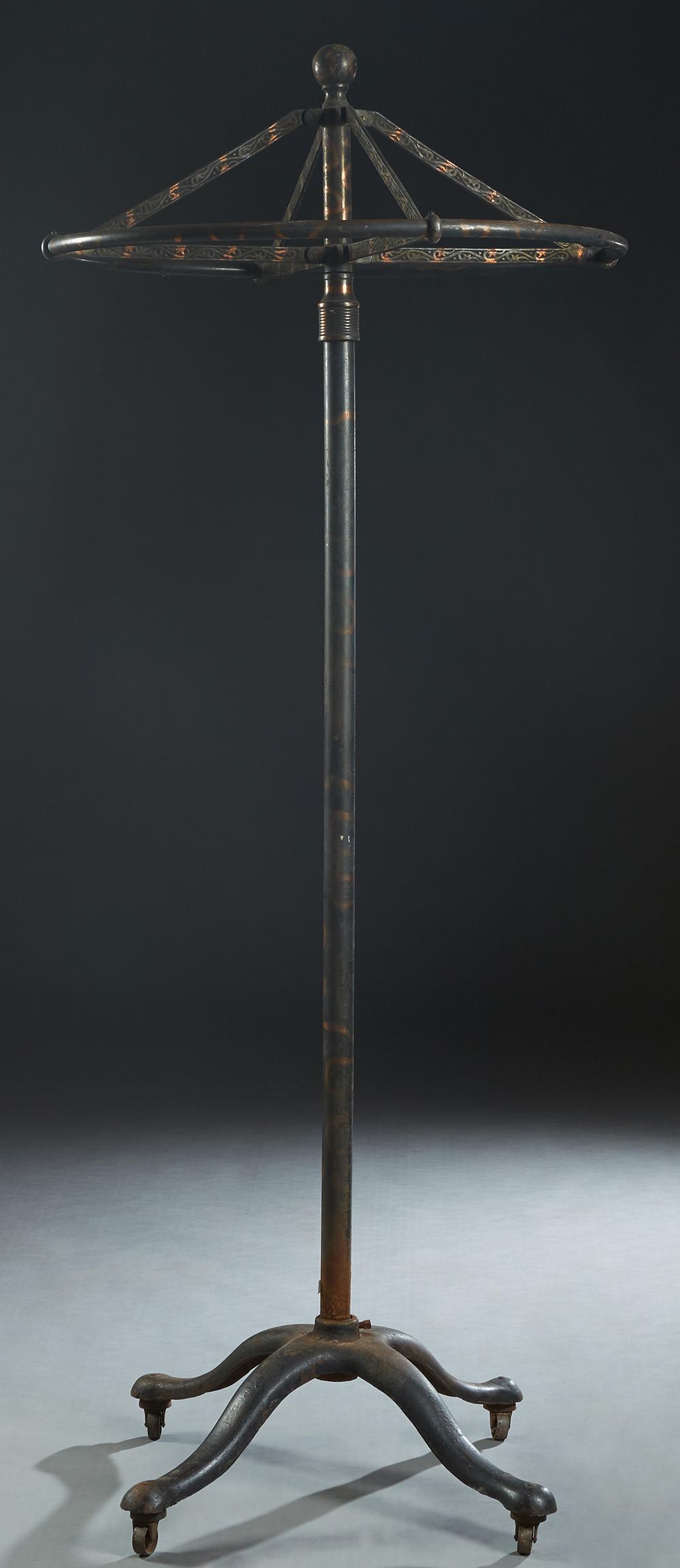 Victorian Copper Plated Iron Revolving Clothing Rack,: Victorian Copper Plated Iron Revolving Clothing Rack, c. 1900, on a circular Japanned support to four splayed legs, H.- 77 in., Dia.- 31 in.