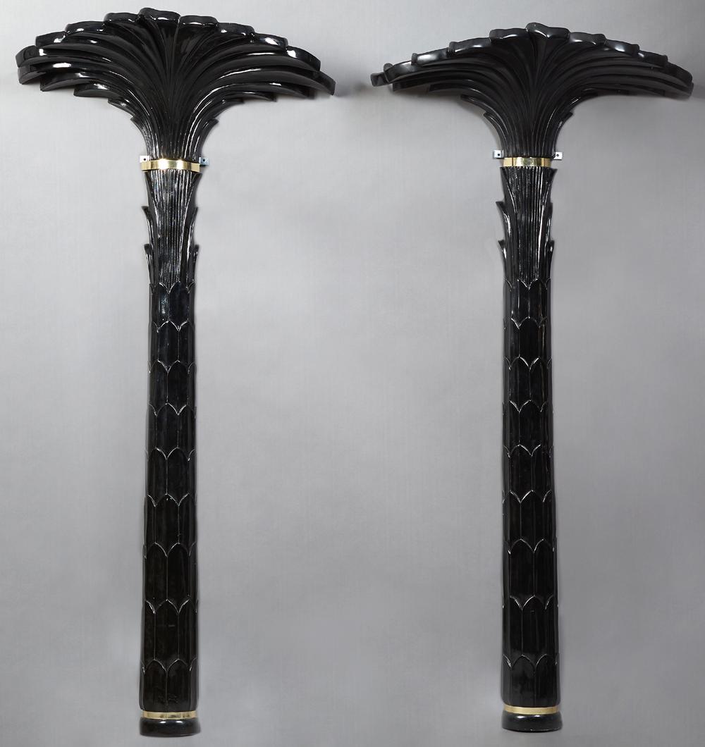 Pair of Serge Roche-Style Ebonized Composition "Palm: Pair of Serge Roche-Style Ebonized Composition "Palm Tree" Torchere-Form Sconces, 20th c., each brass-banded around the base and upper trunk, electrified and mounted for hanging, H.- 80 in., W.- 37 in