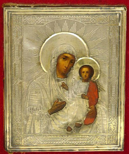 Russian Icon of the Virgin and Child,19th c., egg: Russian Icon of the Virgin and Child,19th c., egg tempera on board, silver clad, dated 1887, mounted in a shadowbox frame, H.- 4 3/8 in., W.- 3 5/8 in.