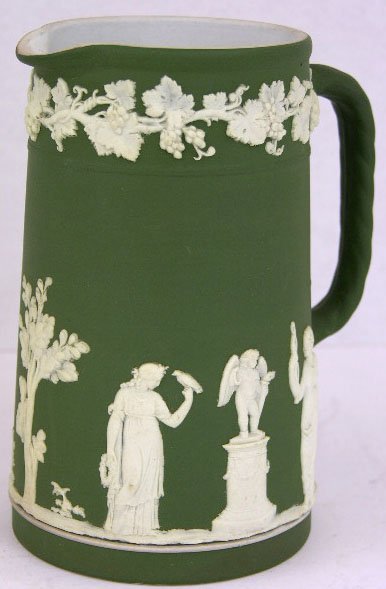 Wedgwood Green Jasperware Pitcher, c. 1900, with re: Wedgwood Green Jasperware Pitcher, c. 1900, with relief white decoration of classical scenes, H.- 6 5/16 in., W.- 5 in., D.- 3 3/4 in.