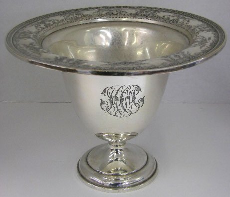 Sterling Footed Trumpet Form Center Bowl, early 20: Sterling Footed Trumpet Form Center Bowl, early 20th c., by International Silver, #1878, with a floral relief decorated rim, retailed by Black, Starr & Frost, New York, H.- 7 1/2 in., Dia.- 10 1/8 in.