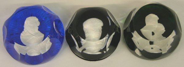 Three Sulphide Paperweights, 20th c., consisting o: Three Sulphide Paperweights, 20th c., consisting of "Eleanor Roosevelt," by Baccarat, and "John James Audubon," and "John and Jackie Kennedy," both by Cristalleries Albret, France.