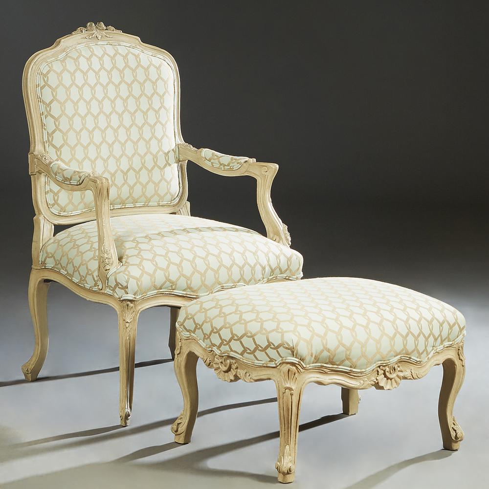 Louis XV Style Carved and Polychromed Beech Fauteuil,: Louis XV Style Carved and Polychromed Beech Fauteuil, 20th c., the arched canted floral carved upholstered back over upholstered arms and a bowed upholstered seat with a shell carved skirt, on scrolle