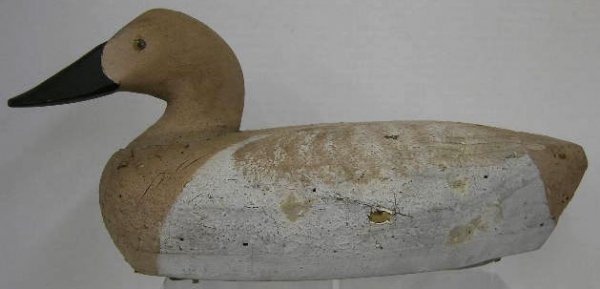 Carved Wooden Duck Decoy, 20th c., with original : Carved Wooden Duck Decoy, 20th c., with original brown and grey paint, H.- 8 in., W.- 6 in., D.- 7 1/8 in.
