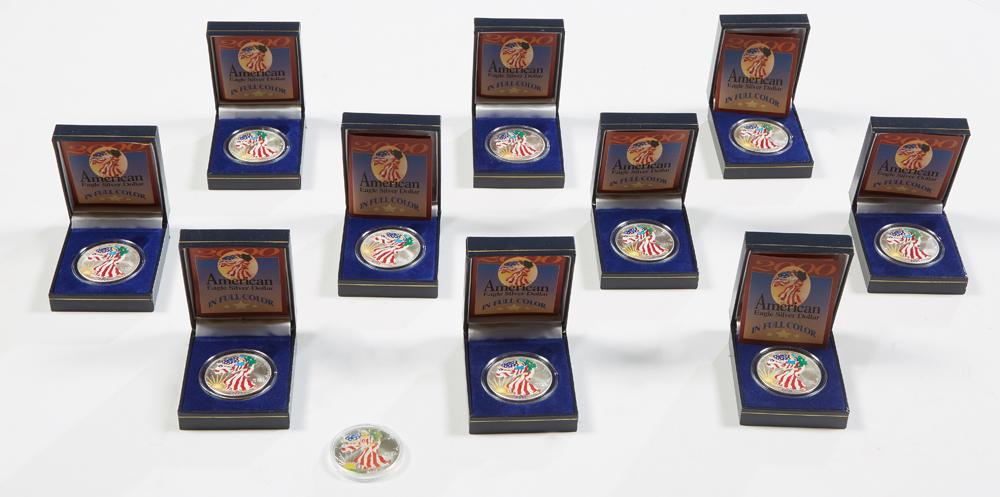 Group of Eleven Painted American Eagle Silver Dollars, (1 of 3)