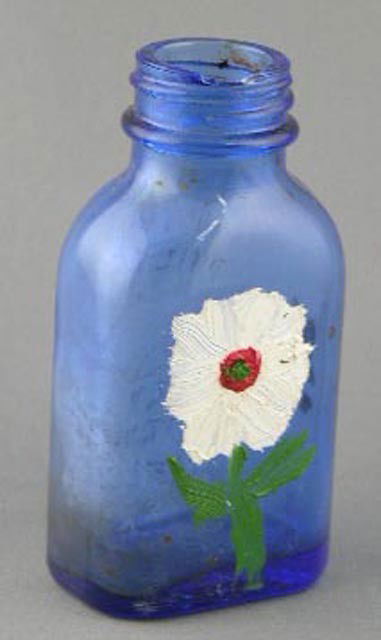 Clementine Hunter (1887-1988), "White Flow: Clementine Hunter (1887-1988), "White Flower," c. 1970, oil on blue Phillip's milk of magnesia tablets bottle, signed,, H.-3 1/2 in., W.- 1 7/8 in., D.-1 1/8 in.