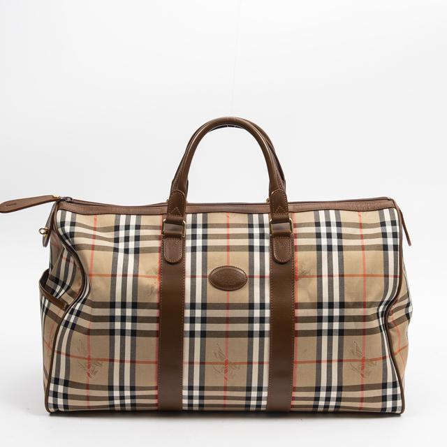 Burberry Boston Travel Bag, in beige haymarket check: Burberry Boston Travel Bag, in beige haymarket check coated canvas with brown leather accents and golden hardware, opening to a brown canvas lined interior with a side zip closure storage pocket, acco