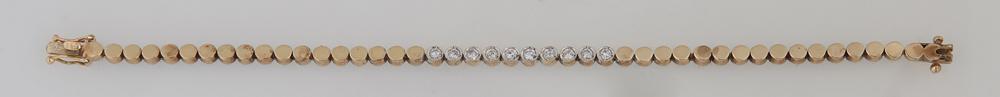 14K Yellow Gold Link Bracelet, with cylindrical links,: 14K Yellow Gold Link Bracelet, with cylindrical links, the center ten links with a channel set ten point round diamond, Total Diamond Wt.- 1 carat, L.- 6 5/8 in., Wt.- .31 Troy Oz.
