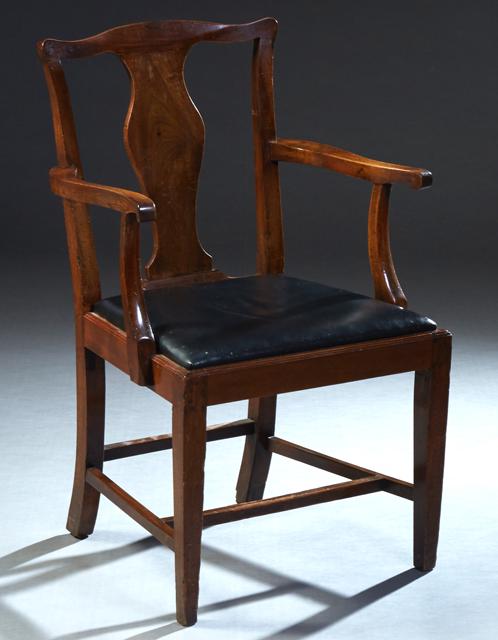 English Georgian Carved Mahogany Chippendale Style: English Georgian Carved Mahogany Chippendale Style Armchair, 19th c., the arched crest rail over a vasiform splat to a blue trapezoidal leather covered slip seat, flanked by curved rails, on tapered s