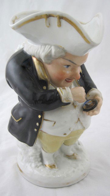 Rare Jacob Petit Old Paris Porcelain Figural Pitche: Rare Jacob Petit Old Paris Porcelain Figural Pitcher, c. 1850, of a man using snuff, painted snuffbox in hand, the bottom signed "J. P" under glaze in blue, H.- 8 in., W.- 4 1/4 in., D.- 5 1/2 in.