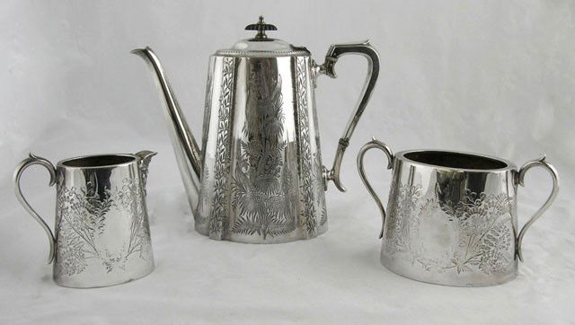 English Assembled Silver Plated Tea Set, c. 1880,: English Assembled Silver Plated Tea Set, c. 1880, Sheffield, consisting of a sugar and creamer, by Philip Ashberry & Sons, and a teapot by John Gallmore, all with engraved floral decoration.