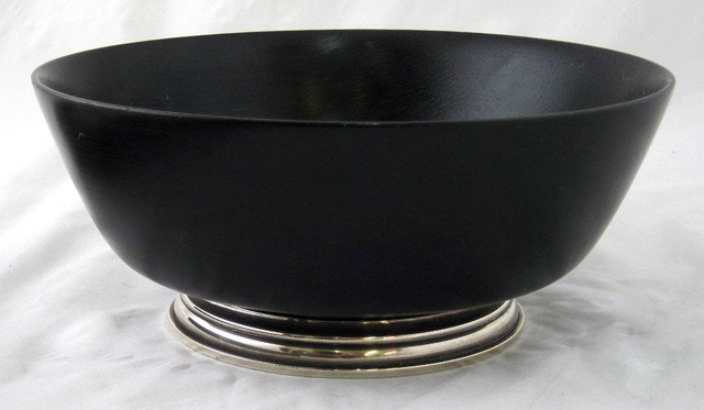 Ebonized Wood Center Bowl, mid 20th c., with a ste: Ebonized Wood Center Bowl, mid 20th c., with a sterling rimmed foot, H.- 4 1/4 in., Dia.- 10 in.