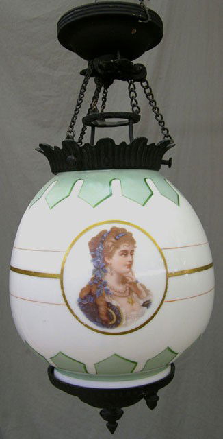 Victorian Opaline Glass and Iron Parlor Hanging Li: Victorian Opaline Glass and Iron Parlor Hanging Light, 19th c., having been a pull down light, the opaline glass baluster form bulb with green and gilt decoration, the sides with three transfer cartou