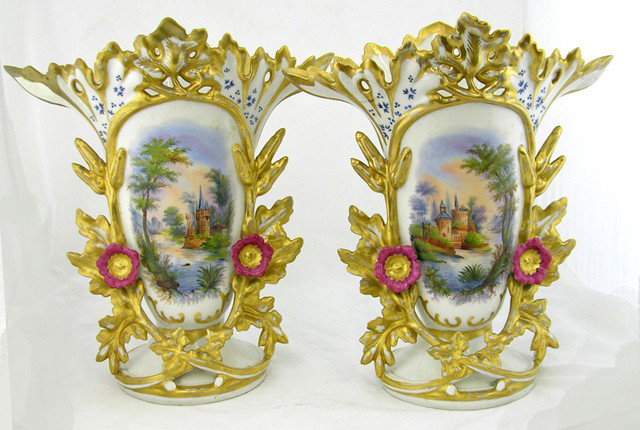 Pair of Old Paris Porcelain Garniture Flare Vases,: Pair of Old Paris Porcelain Garniture Flare Vases, c. 1850 with applied leaf and floral decoration encircling central reserves of castles, the underside signed "L," in red script underglaze, H.- 16 7/