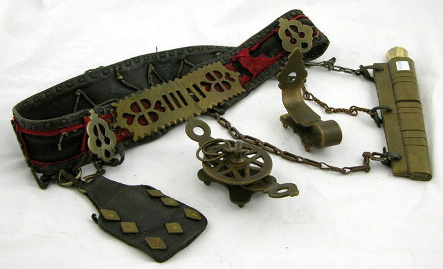 Chukcha (Siberian Eskimo) Leather and Brass Belt,: Chukcha (Siberian Eskimo) Leather and Brass Belt, early 20th c., with a pendant bone handled dagger and flint pouch, H.- 3 in., W.- 38 1/2 in., H.- 17 1/2 in., W.- 10 in.