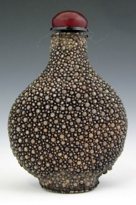 Shagreen Snuff Bottle, early 20th c., with a hard: Shagreen Snuff Bottle, early 20th c., with a hard stone stopper, H.- 2 3/8 in., W.- 1 5/8 in., D.- 1 in. Provenance: Collection of Virginia A. Rice, New Orleans Louisiana; member of the International
