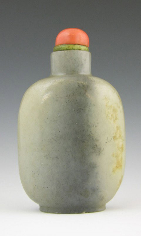Old Carved Jade Snuff Bottle, early 20th c., with : Old Carved Jade Snuff Bottle, early 20th c., with an orange hard stone stopper, H.- 3 1/4 in., W.- 2 in., D.- 7/8 in. Provenance: Collection of Virginia A. Rice, New Orleans Louisiana; member of the I