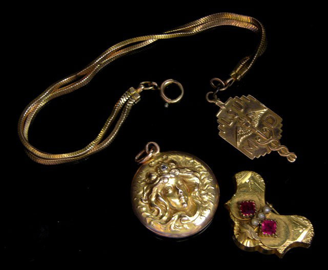 Group of 10K Yellow Gold Items- art nouveau locke: Group of 10K Yellow Gold Items- art nouveau locket mounted with a small diamond, brooch with seed pearls, and an LSU Medical pendant and mesh bracelet, 1937, wt.- .78 troy oz.