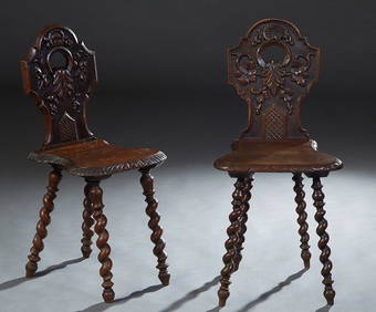 Pair of French Renaissance Style Carved Oak Hall Chairs, 19th c., the arched canted leaf carved back (1 of 1)