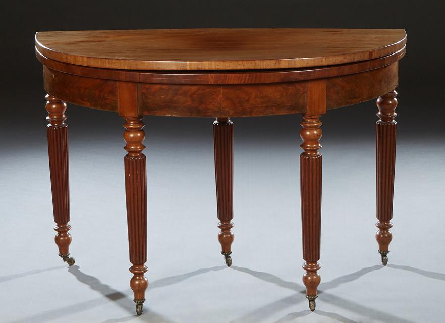 French Carved Walnut Demilune Games Table, 19th c., the lifting top with a central baize lined (1 of 2)