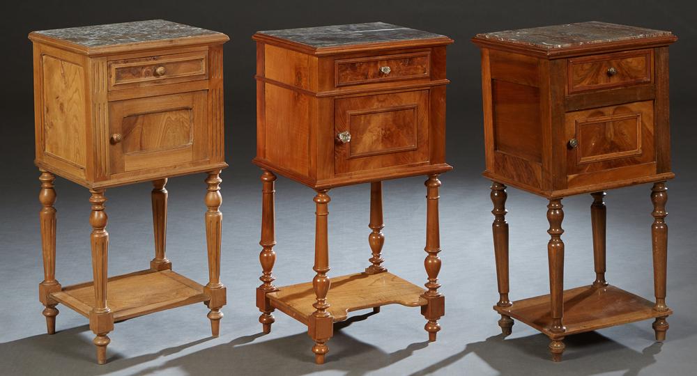 Group of Three Similar French Carved Walnut Marble Top Nightstands, early 20th c., the inset figured (1 of 1)
