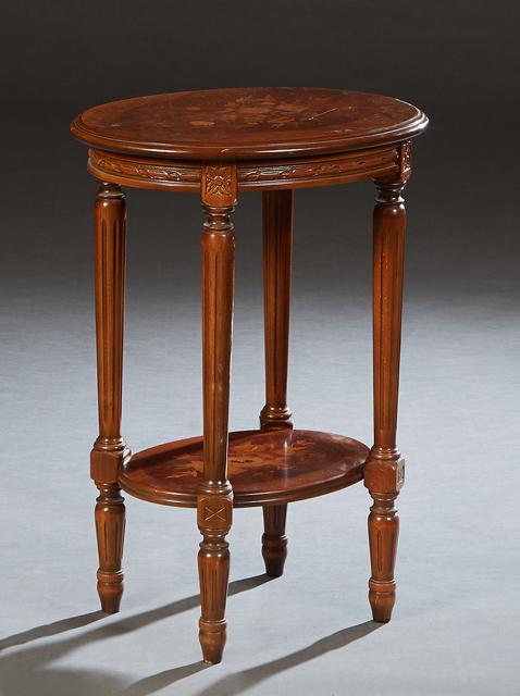 French Louis XVI Style Marquetry Inlaid Carved Cherry Lamp Table, 20th c., the oval stepped floral (1 of 1)