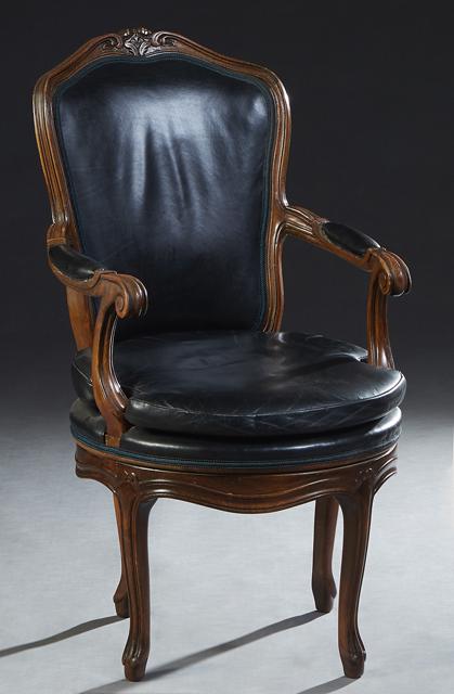 Louis XV Style Swivel Desk Chair, 20th c., the arched floral carved crest rail over a cushioned (1 of 1)