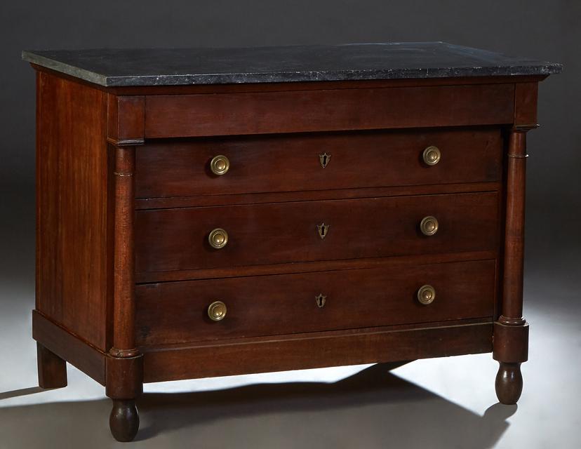 French Empire Style Carved Walnut Marble Top Commode, 19th c., the figured black marble over a (1 of 1)