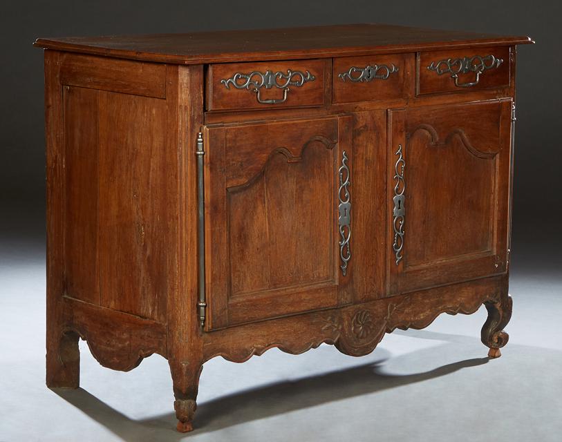 French Provincial Carved Oak Louis XV Style Sideboard, 19th c., the stepped rectangular top over (1 of 1)