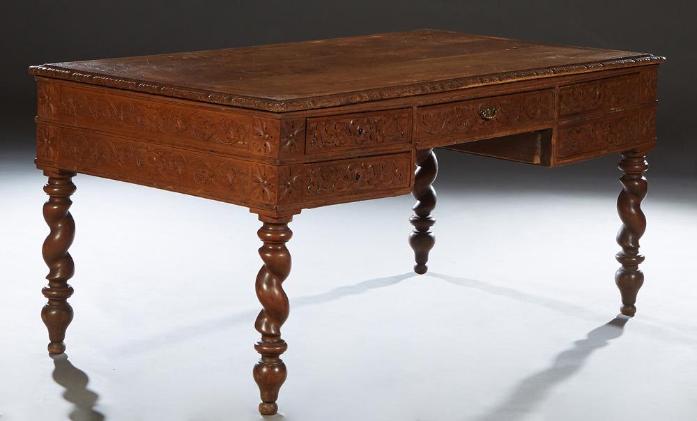 French Henri II Style Carved Oak Desk, c. 1880, the stepped edge top over a central frieze drawer, (1 of 1)