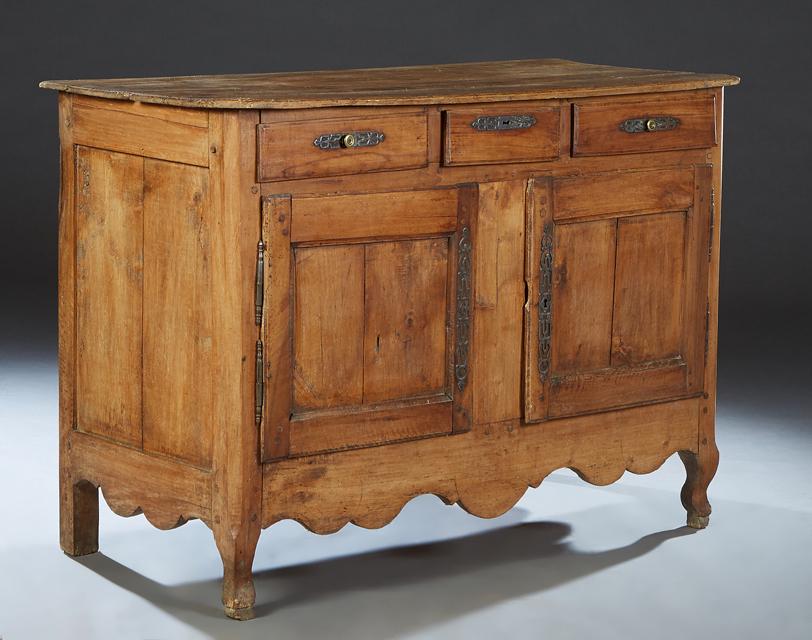 French Provincial Carved Poplar Louis XV Style Sideboard, 19th c., the ogee edge canted corner four (1 of 1)