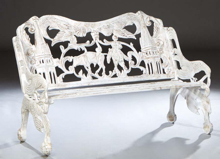 Cast Aluminum Garden Bench, 20th/21st c., the pierced serpentine back with figural and steeple: Cast Aluminum Garden Bench, 20th/21st c., the pierced serpentine back with figural and steeple decorations, flanked by bird form arms, joined by a slatted seat, on bird form supports to large ball and