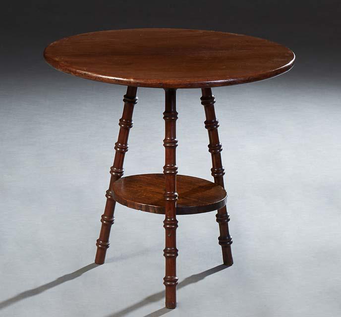 English Carved Oak Lamp Table, early 20th c., the circular top on turned tripodal legs, joined by a (1 of 6)