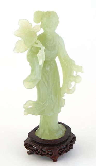 Asian Carved Jade Standing Kwn Yin Figure, 20th c., holding a flower, H.- 7 in., W.- 3 1/2 in., D.- (1 of 1)