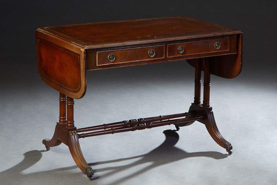 English Carved Mahogany Drop Leaf Sofa Table, 20th c., with an inset gilt tooled brown leather top (1 of 2)