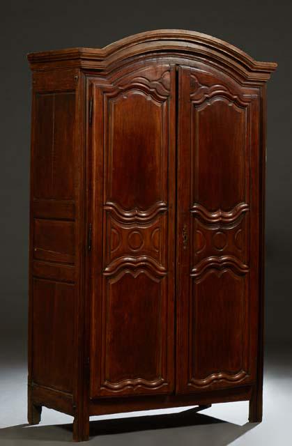 French Provincial Louis XVI Style Carved Walnut Armoire, early 19th c., the arched stepped crown (1 of 1)