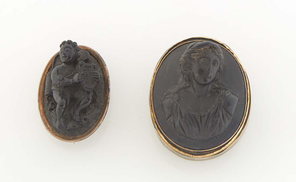 Two Carved Lava Cameos, 19th c., one of a classical woman in relief, on a brass back; the second of (1 of 1)