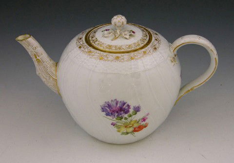 KPM Porcelain Teapot, 19th c., with floral and gilt: KPM Porcelain Teapot, 19th c., with floral and gilt decoration, the lid with relief decoration, H.- 5 1/4 in., W.- 8 1/2 in., D.- 5 1/8 in.