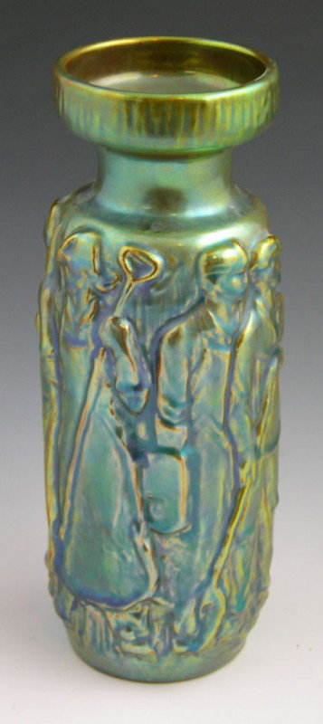 Zsolnay Iridescent Baluster Vase, 20th c., Hungary: Zsolnay Iridescent Baluster Vase, 20th c., Hungary, with relief decoration of farmers, H.- 8 1/2 in., Dia.- 3 1/4 in.