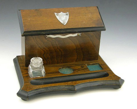 Edwardian Carved Oak Inkstand, c. 1910, the rear w
