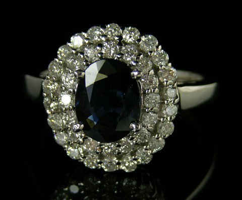 14K White Gold Lady's Dinner Ring, with an oval 2.
