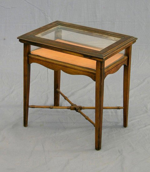 Diminutive Carved Beech Display Table, 20th c., o: Diminutive Carved Beech Display Table, 20th c., on tapered reeded square legs joined by a turned X-form stretcher, H.- 21 in., W.- 20 3/4 in., D.- 14 3/4 in.